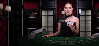 tstoto login web interface showing Piala Indonesia match and live roulette table side by side
